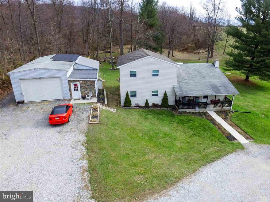 Want to hunt and fish in your own back yard? This home features 4 bdrs and 3 full bths. Spacious open area incl. living rm, dining area, and kitchen. 1st flr also has a den, 3 bdrs and 2 full bth. 2nd flr has mstr suite which has a marvelous wlk in closet, spacious full bth and access to the fascinating balcony w/ incredible views of the pond. Outside is a massive detached garage. Along with the balcony there is a covered dck and covered porch perfect for watching the wildlife on this phenomenal property.