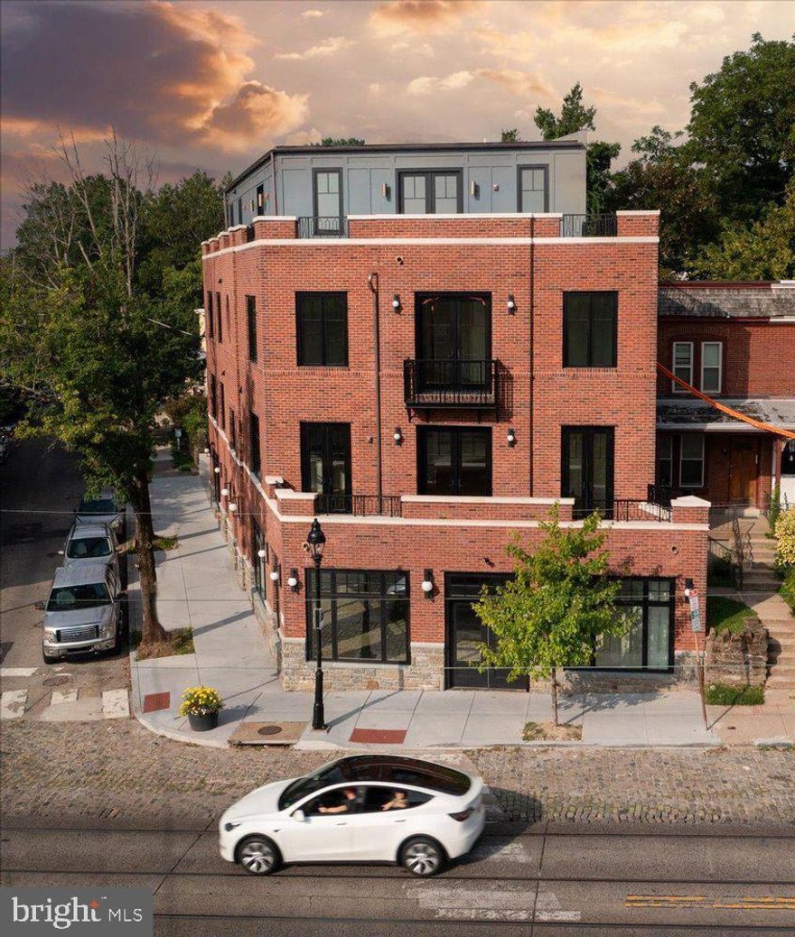 Enjoy boutique living, luxury comfort and village vibrancy at 8100 Germantown Avenue. Offered for the first time, this 2200 sqft flat is both timeless and modern while being situated in the heart of Chestnut Hill, Philadelphia's beautiful Garden District.

Enter into a gallery foyer that is ideal for displaying artwork and welcoming guests. This two-bedroom, two-and-a-half-bathroom home has a gracious and open floor plan with custom selections throughout. A designer chef’s kitchen with a island overlooks both the light-filled dining area and spacious living room. Perfect for entertaining, an open air terrace that spans the entire front of the building showcases picturesque views of “The Avenue”. Just off of the living areas, there is a powder room and a laundry room. Both bedrooms are generously sized with ensuite baths and excellent closet space. All of the living spaces are drench in southern exposure which fills the spaces with soothing light all day long.

Additionally, the apartment is exceptionally soundproof, featuring the highest quality doors, windows, and insulation. This ensures a peaceful living environment right in the heart of the village.

The location gives unparalleled access to all the conveniences within the village of Chestnut Hill. Lovely restaurants, cozy cafes, serene parks, excellent schools, and public transportation options are within easy reach. Enjoy private off-street parking, high-end modern efficiencies and maintenance-free living in Philadelphia’s most sought after neighborhood. Don’t miss out on the unique opportunity to make this incredible home yours!