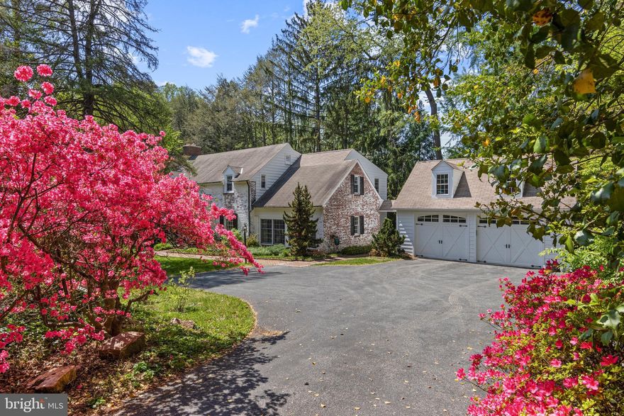 Timeless elegance meets modern comfort at this 1946 Colonial oasis on almost an acre in a prime location in the Wallingford Elementary catchment area.  Step into a piece of history, beautifully updated for today's discerning buyer. This exceptional 4-bedroom, 3.5-bathroom Colonial home, is nestled on a breathtaking acre of lush lawn adorned with stunning flowering trees, offering a truly peaceful and private oasis.
From the moment you arrive, you'll be captivated by the timeless architectural details that make homes of this era so special. Beautiful wide-plank floors underfoot and charming built-in cabinetry that speak to a bygone era of craftsmanship. This home seamlessly blends its historic charm with thoughtful additions designed for modern living.  The heart of the home is undoubtedly the large, inviting eat-in kitchen, perfectly appointed for both casual family meals and gourmet entertaining. This tastefully appointed space flows effortlessly into a wonderful family room, creating an open and connected atmosphere. Practicality abounds with a dedicated utility room featuring washer/dryer hook-ups, a convenient mudroom, and a covered breezeway providing sheltered access to the two-car garage. The formal living room is a truly special space, exuding warmth and character with it's stately fireplace and built-in bookshelves. Step outside from here to discover an exceptional deck with outdoor living and dining spaces which also connects to the kitchen, perfect for enjoying al fresco meals or simply relaxing amidst the serene surroundings. The large and welcoming dining room is also poised for memorable gatherings.
Upstairs, retreat to the very spacious primary bedroom, a true sanctuary complete with ample closet space and a beautifully renovated en-suite bathroom. Three additional generously sized bedrooms provide comfort and privacy for family or guests. An adaptable office area and two more tastefully renovated bathrooms on the second floor complete the upper level, ensuring everyone has their own space.
The partially finished basement offers exciting potential, featuring an additional laundry room, a workshop area, and a convenient door leading directly to the outside – a versatile space ready for a myriad of uses, from a home gym to a recreation room or additional storage.
The grounds of this property are truly unparalleled – an incredibly special feature that sets this home apart. Experience the tranquility of a country-like setting with expansive lawns and vibrant, mature landscaping that creates a picturesque backdrop for everyday living. Despite this idyllic privacy, you are just minutes from the vibrant downtown Media, with its array of shops, restaurants, and entertainment. Commuting is a breeze with the SEPTA train station just a short walk away.
Don't miss this rare opportunity to own a home that perfectly marries historic grandeur with contemporary convenience in an unbeatable location. Schedule your private tour today and prepare to fall in love!