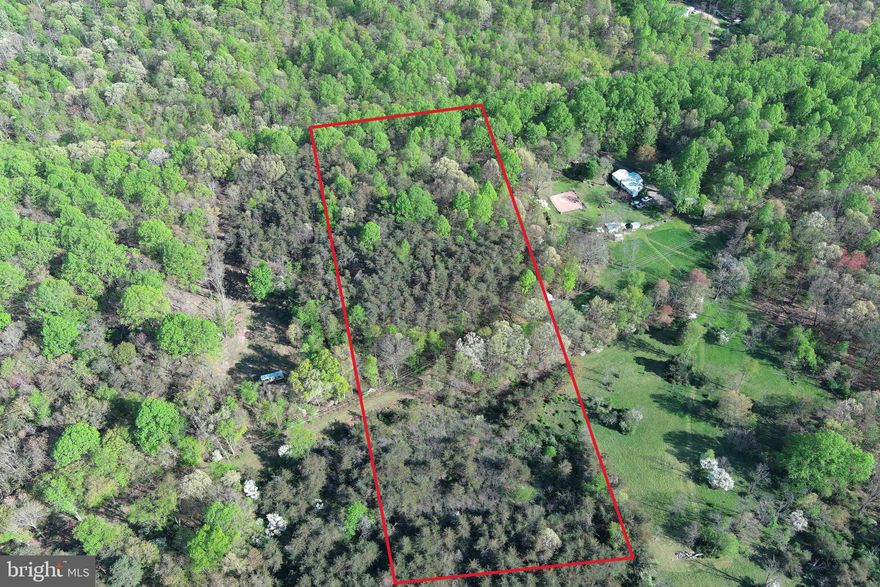 READY AND WAITING FOR IT'S NEXT OWNER TO ENJOY.  AT ONE TIME THIS 6 ACRE TRACT WAS THE OWNER'S SPOT TO GET AWAY FROM THE STRESSES OF LIFE AND TAKE ADVANTAGE OF THE PEACE AND TRANQUILITY THAT THE MOUNTAIN STATE CAN PROVIDE.  AN OLD DRIVEWAY WILL LEAD YOU FROM THE STATE MAINTAINED - PAVED ROAD TO A CAMP SPOT EQUIPPED WITH A WELL.  VISITING HERE GIVES A SENSE OF WHAT ONCE WAS SOMEONE'S PERSONAL RETREAT.  NOW, IT IS TIME FOR SOMEONE ELSE TAKE THE TORCH AND MAKE IT THEIR OWN.  THE GENTLE TOPOGRAPHY LENDS ITSELF TO EASE OF USE.  WITH SOME INFRASTRUCTURE IN PLACE AND MINIMAL RESTRICTIONS, YOU WILL HAVE THE FREEDOM TO CREATE YOUR OWN LITTLE SLICE OF "ALMOST HEAVEN" WITH NOT MUCH COST OR PLANNING.  CHECK IT OUT TODAY!