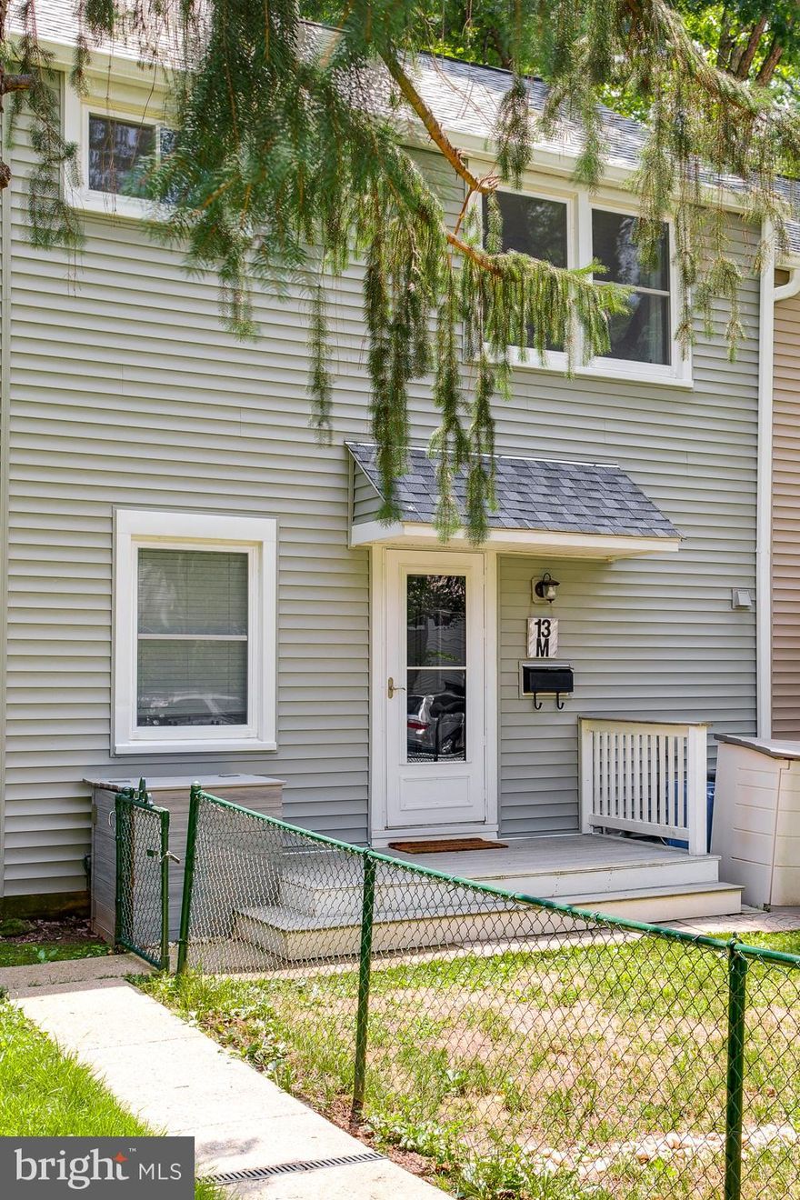 ***COZY, EFFICIENT, UPGRADED***  best describes this home.  Let's start with the charming fenced in front and rear yard, then to the UPDATED kitchen with stainless steel appliances and UPDATED flooring on the main level, with new carpet on the stairs, and the original hardwood floors on the upper level, there is also a full-size stackable washer and dryer.  The 13-M Unit also has One & a Half Baths, UPGRADED  Water Heater, HEAT PUMP, and CEILING FANS in the two bedrooms and family room. The upstairs has been meticulously maintained along with the ATTIC being improved, flooring for Storage and UPGRADED  insulation.  The roof, windows, and siding have been replaced along with the exterior insulation which has been UPGRADED and UPGRADED Soundproof Drywall.  Enjoy the large 18 x 20 rear deck and large shed.  Hurry, grab this opportunity to buy in Historic Greenbelt!***TO LEARN MORE GO TO - WWW.GHI.COOP****PROPERTY TAXRS are INCLUDED in the monthly COOP FEE***