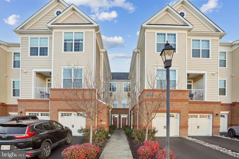 Photo of 23255 Milltown Knoll Square #110, ASHBURN, VA 20148 (MLS # VALO2117872)