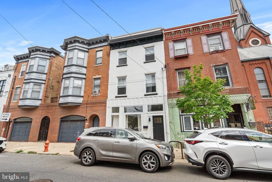 Welcome to this beautifully renovated 4-bedroom, 3-bath home nestled in the vibrant heart of Northern Liberties. Combining modern luxury with the charm of one of Philadelphia's most sought-after neighborhoods, this home offers the perfect balance of style, convenience, and comfort. As you enter, you’ll immediately notice the spacious open floor plan, designed for both everyday living and entertaining. The stunning eat-in kitchen features sleek stainless steel appliances, offering both functionality and style. Ample counter space, modern cabinetry, and a bright, airy atmosphere make this kitchen the heart of the home. The expansive living and dining areas flow seamlessly, creating a versatile space for family gatherings or hosting friends. Four generously sized bedrooms provide plenty of room to relax and unwind, with large windows allowing natural light to fill the rooms. Each of the three beautifully designed bathrooms has been tastefully updated with contemporary fixtures and finishes. This property also boasts modern conveniences such as central air, stylish flooring, and a fully updated interior, ensuring that every inch of the home is move-in ready. But it’s not just the home that’s impressive—it’s the location! Situated in one of Philadelphia's most vibrant neighborhoods, you'll have access to everything Northern Liberties has to offer. Great restaurants, unique shopping boutiques, and exciting nightlife are just around the corner, while you still enjoy the welcoming, close-knit neighborhood atmosphere. Commuting is a breeze with easy access to public transportation, I-95 North and South, and quick in-and-out access to the city. This is a rare opportunity to own a fully renovated home in an unbeatable location. Don’t miss out—schedule your tour today and experience Northern Liberties living at its finest!