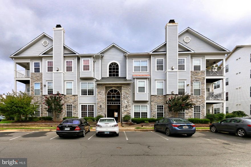 Gorgeous 2 bed/2bath luxurious condo with high ceilings, open layout, kitchen with granite & SS appliances. NEW floors & NEW paint throughout. TONS of lrg windows for great light. Fireplace (gas) in lrg living room w/ high ceilings. Sep dining room w/ sliding glass door that walks out to corner porch. Located right off of the I-95N/I-495 for an easy commute. Storage closet