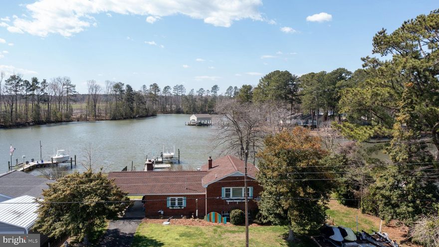 Priced to sell! A great opportunity to own a waterfront home in the Northern Neck of Virginia. A turnkey opportunity awaits with this 2 BDRM home which offers 100’ of waterfront with a pier, 8,000 pound boat lift, jet ski pads and MAGNIFICENT views. Minutes from the wide body of the Potomac River and 17 miles from the mouth of the Chesapeake Bay enjoy your summers crabbing, fishing, boating, kayaking and biking. Or just sit back and enjoy watching nature unfold from your beautiful year round porch. Most all furnishings convey. (Couch and small patio table excluded) A large storage shed with lots of cabinetry provides excellent storage and a workshop area. Short term vacation rentals are allowed in this golf cart community. Broadband internet is available. Near restaurants, a marina, wineries and breweries.