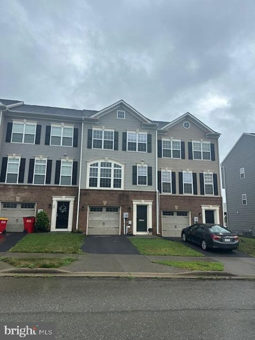 Upscale Community close to everything..3 finished levels  and a fenced backyard.   Very nice move in ready home. If You need a 4th bedroom or office walk out level basement is great with a half bath all 3 levels have bathrooms. Townhouse in  this community just sold for 335k and this Great move in  ready home costs much less then  the Brand New Homes being  built in Charles Town Hurry To see.