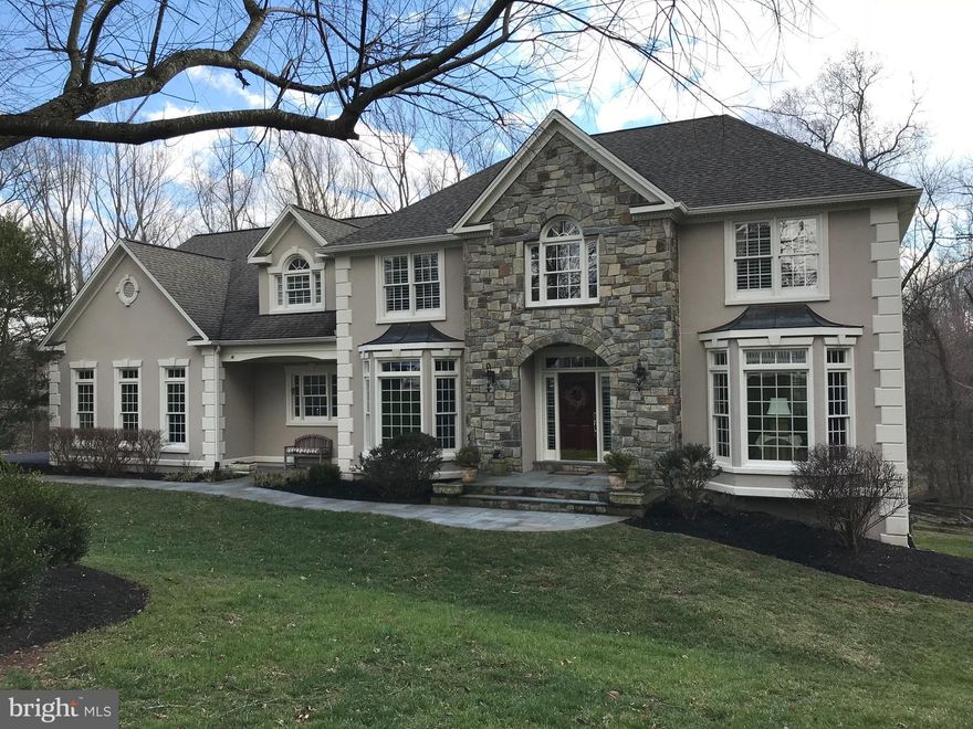 Exquisite estate home on premium 2.97 acre lot backing to Difficult Run. Meticulously maintained w/all the upgrades! 4BR, 5.5BA, 3 car garage & 3 fin lvls. An entertainers dream w/foyer, formal LR & DR, chefs KIT w/top of the line appl, breakfast rm. FR w/coffered ceiling, stone FP. MBR suite w/sitting rm, BA w/heated travertine floor. Serene yard w/deck, screened-in gazebo & mature trees.