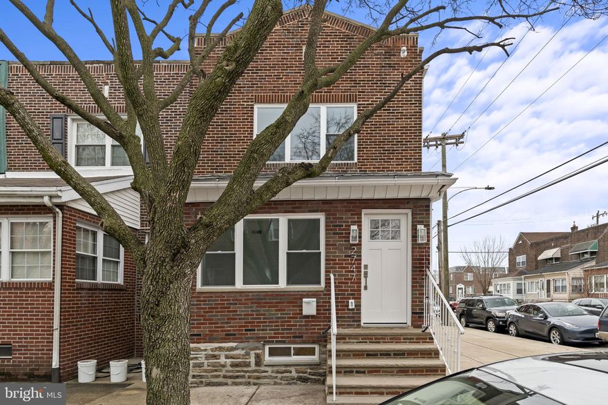 Looking for a beautifully renovated 3-bedroom, 1.5-bath home with on-site PARKING and a 10 year tax abatement? This move-in ready South Philly stunner blends modern updates with comfortable living. Thoughtfully and fully renovated from top to bottom, no detail was missed for the next buyer. Step inside to a bonus sunroom -- a lovely place to hang out, sip coffee, turn into a plant oasis, or simply a reading nook to enjoy natural light year-round. This home offers an open floor plan with hardwood floors throughout as well as high ceilings that create a bright, airy feel throughout the main level. The sleek, updated kitchen flows seamlessly into the living room with all new appliances and beautiful finishes. Upstairs, you’ll find three bedrooms and a modern, crisp, fully updated full hallway bathroom, The fully finished basement adds valuable extra living space—ideal for a media room, playroom, gym, or additional workspace—along with a convenient half bath. Outside, enjoy a generous backyard with plenty of room for gatherings, gardening, or simply unwinding. Spruce up to make your own. Close by local transportation and the perks of South Philly living.