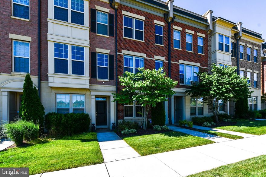 A stunning condo located in Potomac Overlook with a panoramic view of the Washington DC, Alexandria, VA and National Harbor skyline. These condos were designed with plenty of space to accommodate your family. A large open concept kitchen, dining room and family room with hardwood flooring, designer storage and wine cabinets, high-end stainless steel appliances, granite countertops, plumbing features and designer lighting. Each of the 4 spacious bedrooms have their own full bathroom and roomy walk-in closets. You have inside access from the garage into the lower-level where you will find a full bathroom and a charming office space with lots of natural lighting. This room could be used as a 4th bedroom if desired. The top level has a spacious loft complete with a full wet-bar with refrigerator, dishwasher and sink. There is large bedroom with a full bathroom and a rooftop terrace perfect for entertaining.  This is a private gated community. This location is perfect for commuters working in DC, Maryland or Virginia as you are seconds from the beltway entrance to each location. Also, enjoy fine dining, shopping and entertainment at the MGM theatre and casino.