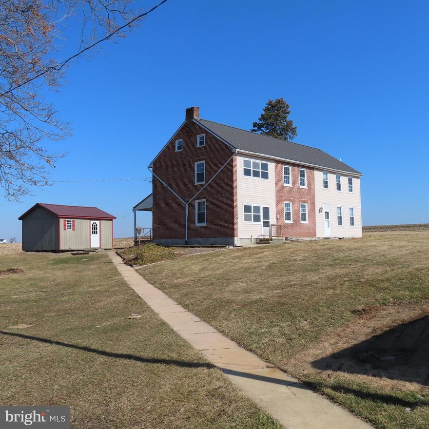 LARGE 5 BEDROOM HOME - The brick and stone farm house features 5 bedrooms and 3 baths.  The main level features an equipped kitchen with room for a table, a formal dinning room, and a living room and family room side by side.  Also includes a full bath,  a canning kitchen with laundry hook up.  Upstairs features 5 bedrooms and 2 full baths plus an attic for storage.  Tenant does lawn care and their own snow removal.    Owner does plow out the lane.  This property is Farmed by the owner and the tenant dose not have use of the barn and the fields.  No pets and No Smoking allowed in this home.