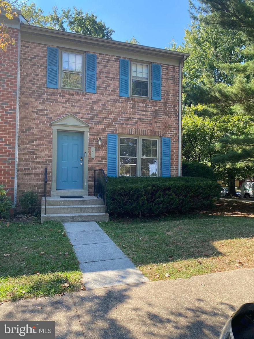 Spacious end-unit townhome Available for October 2023. The main level features hardwood flooring, foyer with convenient powder room, large living room, separate dining room opening to an inviting deck, and an updated kitchen with stainless-steel appliances, granite countertops and abundant cabinet space. The bedroom level features the primary bedroom with ensuite bathroom, and a similar size second bedroom serviced by a full bath. The lower level has the laundry with full sized washer, dryer, utility sink, ample storage and a great room with woodburning fireplace.   The exterior features a wooded backyard with a patio, plus 2 assigned parking spaces convey. Shown by appointment.