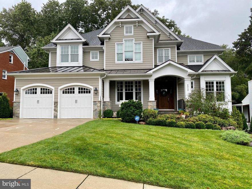 Welcome to 4012 N Woodstock St Arlington, a gorgeous 2015 Custom Craftsman home thoughtfully built by Sunline Homes on a lush 10,000 sqft landscaped grounds. Enjoy 6500 sqft of beautifully appointed spaces, with 10' ceilings on the main level, 9'5" on the second floor and 9' on the lower level. Your guest will be welcomed by a foyer, flanked by the formal lounge and formal dining room. The eat-in kitchen is well appointed with inset cabinetry, marble counters, marble backsplash, a large center island, a built-in banquet with beverage fridge, a built-in desk, wolf 6-burner range with double oven, side by side subzero fridge/freezer, cabinet front dishwasher, kitchen table space, walk-in pantry and access to screen porch and family room. Other features on the main level include a family room with gas fireplace, built-ins and stone facade fireplace, an office or playroom, mudroom off the well-appointed garage with custom storage and epoxy floor. The second level houses the primary suite, two walk-in closets, serene bathroom with double sinks, soaking tub and glass enclosed shower. Two secondary bedrooms share a full bath with double sinks and separate shower/tub and both have spacious walk-in closets with custom built-ins. The 4th bedroom has its own dedicated full bath and custom walk-in closet. The laundry room is located on this level and has floor to ceiling built-ins and folding station. The lower level houses the 5th & 6th bedroom, full bath, beautifully crafted temperature-controlled wine cellar, large storage room, exercise room, media room and rec-room with access to the rear yard. The fully fenced backyard backs to county parkland with mature trees and year-round privacy. The yard has been landscaped by a local landscaper to include retaining walls, garden beds, year-round blooms, plenty of play space and a kid's tree swing . Other features include custom window treatments, sprinkler system, built-in speakers in screen porch, kitchen, family room, Elfa systems in all closets, dimmers throughout house, ring security system, & gas line to stone patio for grilling.  Easy commute to DC (only one stop light), Tysons, Pentagon, Pentagon City and Dulles. Schools Jamestown, Williamsburg and Yorktown. Going active Oct. 18th and pictures posted then.