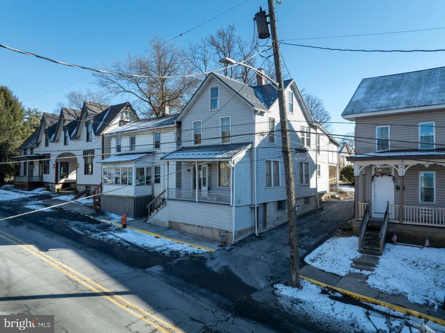 Step inside this charming 1890s three‑story home in the heart of Bellefonte, where original hardwood floors and historic details create a warm atmosphere. This 4‑bed, 1‑bath property features a seamless main‑level layout with a welcoming foyer that opens into the living and dining areas. The efficient L‑shaped kitchen includes a peninsula for added prep space and casual seating, along with access to a cozy covered porch overlooking the backyard. The second floor offers a full bath and three nicely sized bedrooms, including one with private access to a deck with backyard views. The third floor provides a spacious additional bedroom with a walk‑in closet. A full unfinished basement provides laundry and ample storage, and the exterior includes a two‑car detached garage plus two off‑street parking spaces, rounding out this versatile and character‑filled home. Schedule your showing today! Property being sold as is.