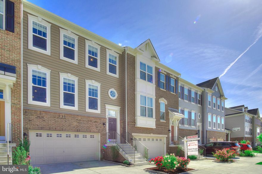 Beautiful townhome in the sought-after Belmont Run community in Broadlands with lots of upgrades, freshly painted, and a fully finished and coated attached garage. Over 2300 sq ft of finished living space, 2-car garage, 4 spacious bedrooms with walk-in closets, and 3.5 baths. The Haddington model offers an open floor plan concept. The kitchen is every chef's dream with an impressive center island, quartz countertops, ample cabinet space, and stainless steel appliances. As an added feature, the whole house is fitted with RO water filtration. A fabulous living room and dining room lead out to a beautiful deck backing to woods and common grounds. On the upper level is a gorgeous owner's suite with two walk-in closets and a private bathroom with a soaking tub, separate shower, and dual sinks. The lower level has a full bathroom and a living space leading out to the private backyard facing lush trees. Lower has extra wall cabinets for more storage, an extra microwave, and a refrigerator for additional use.  Elegant hardwood floors throughout the main level. 9' ceilings on all levels. The property is presently occupied. Close to major commuter routes,  only 2 miles to the new Ashburn Metrorail Station, easy access to Dulles Greenway, and only 10 min to Dulles International Airport by car. Only minutes to Briar Woods High School. Enjoy Brambleton Park, a golf course, a movie theatre, shops, restaurants, and a grocery store within about a 2-mile radius.