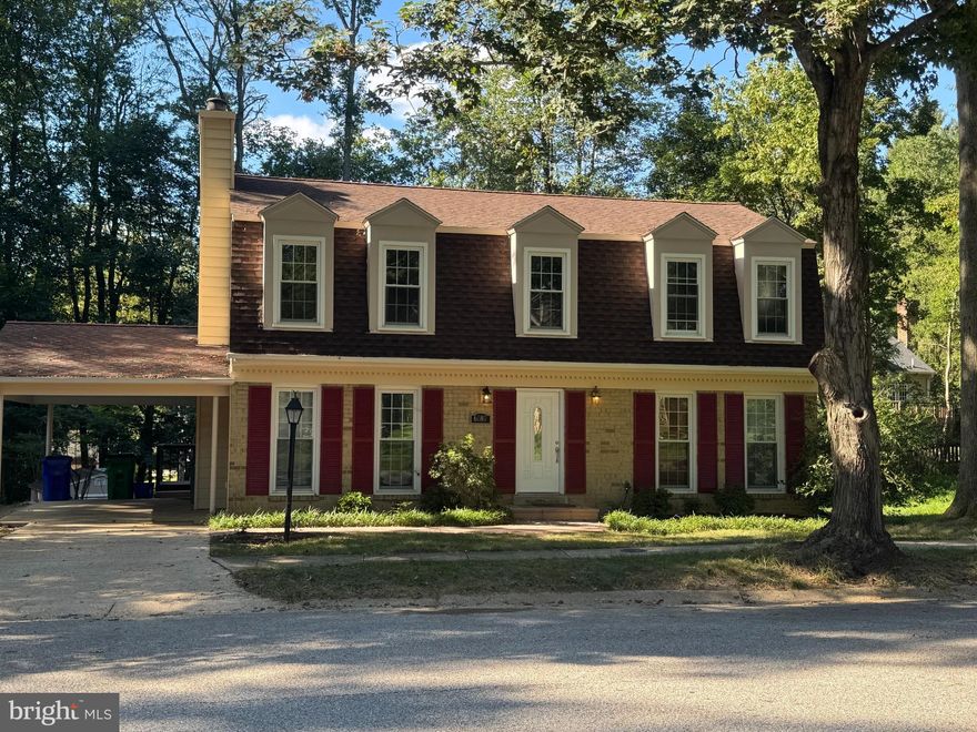 Welcome to 6080 Babylon Crest, a charming Dutch Colonial in the heart of Columbia. From the moment you enter, this home embraces you like a hug with its traditional layout and gleaming cherry hardwood floors. The main level features a good sized family room with fireplace, a spacious living room, a separate dining room, and a beautifully updated eat-in kitchen with crisp white cabinets, Quartz countertops, and stainless steel appliances. Step right out to the large deck—ideal for summer cookouts and gatherings. Upstairs, the primary suite includes a private ensuite bath, complemented by three additional generously sized bedrooms, all with hardwood floors. The partially finished basement offers a versatile bonus room, perfect for a home office or hobby space. Outdoors, the third of an acre wooded lot provides both privacy and potential, with room already prepared for a playground, gazebo, or firepit. All this in Columbia’s thoughtfully planned community, known for its vibrant culture, scenic lakes, extensive pathways, parks, and convenient access to shopping, dining, and commuter routes—truly the perfect balance of comfort, charm, and location.