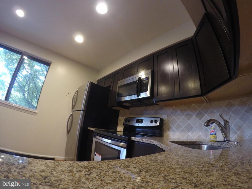 New Renov'd TH. Complete Hardwood and tiled flooring throughout!! Full finished walk-out basement. Blocks to Groceries/Shopping, walking trails, Lake Elkhorn and picnic area. Right off ramps to (I-695, I-95 + rte 32, rte 100).