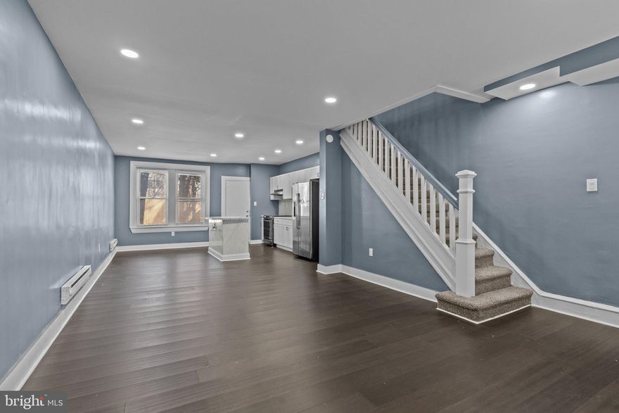 Welcome to 5149 N Fairhill St, a home that stands out from the rest with its expansive front and back yard, sun-drenched foyer, and a complete top-to-bottom renovation designed for both style and comfort. Step inside to an airy, open-concept living space, where the sleek kitchen island with LED lighting becomes the heart of the home. Every detail has been refreshed, from the brand-new windows and doors to the luxury flooring throughout. The fully finished basement with a half bath adds extra versatility, perfect for a home office, gym, or entertainment space. Nestled in the heart of Olney,  this home offers unbeatable convenience with easy access to shopping, dining, and major roadways. If you're looking for a move-in-ready home that blends modern upgrades with charm, this one is calling your name!