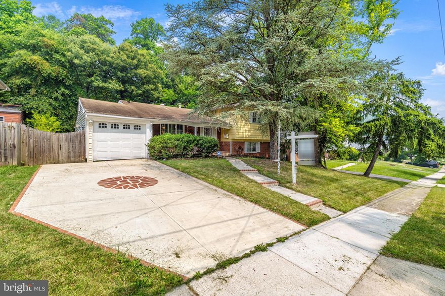 Welcome to 6846 Nashville Road, Lanham, MD! This charming 3-bedroom, 2.5-bathroom AS-IS split level home is brimming with potential and awaits your personal touch. Nestled on a spacious lot, this property offers a sunroom,  cozy wood-burning fireplace for delightful indoor living and a basketball court perfect for outdoor activities, along with a spacious yard for entertaining. While it requires a little TLC, this is an excellent opportunity to make this house your own. With its convenient location and desirable features, this home is ready for you to transform it into your dream space. Don't miss out on the chance to create a haven in Lanham, MD; convenient access to METRO, schools, parks and major commuter routes. Home Warranty transferred to buyer.