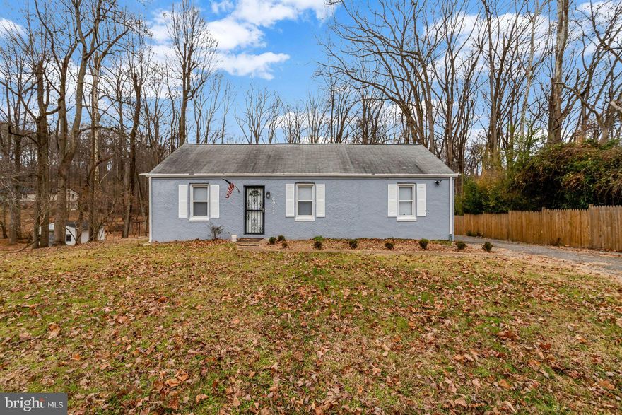 Tucked away on a private, spacious lot that backs to the woods, this charming home has been lovingly cared for and is ready to welcome its next owner. Warm laminate plank floors and painted walls flow throughout most of the house, creating a bright and comfortable atmosphere. The heart of the home is a completely renovated kitchen, designed for both everyday living and entertaining, where family and friends can gather with ease. A workshop at the rear opens to the side yard, perfect for projects or hobbies. Set in a serene, peaceful setting yet just minutes from Andrews AFB and major commuting routes in and out of DC, this home offers a rare combination of comfort, modern updates, and quiet retreat. Seller needs to find Home of choice.