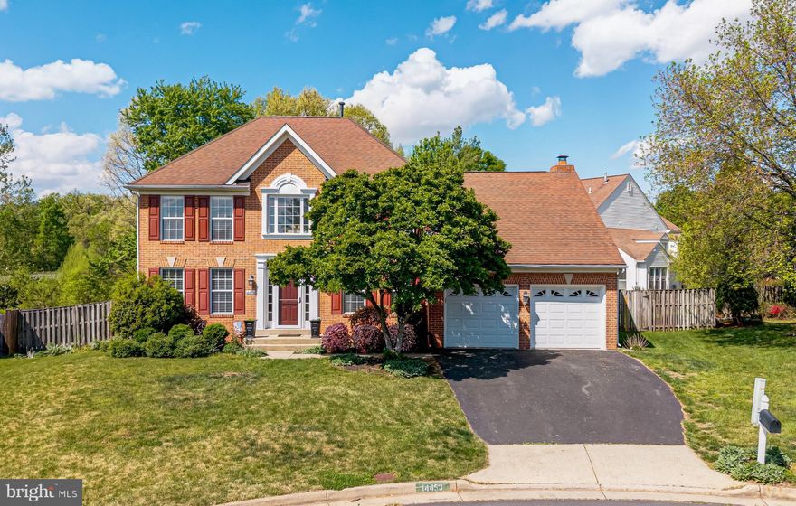OPEN HOUSE THIS SATURDAY 2/25 FROM 12-2PM, ALL OFFERS ARE PRESENTED UPON RECEIPT.
Nestled on a quiet cul-de-sac in the highly sought-after Xanadu Estates, this beautiful Colonial residence offers over 3,100 square feet of thoughtfully designed living space across three finished levels, all set against a serene backdrop of open parkland.

Upon entry, you are welcomed by rich hardwood flooring that flows seamlessly throughout the main and upper levels, extending up the staircase and creating a sense of warmth, continuity, and timeless elegance. Designer chandeliers add a touch of sophistication throughout the home. Just off the foyer, a private study with French doors provides the perfect setting for work or quiet reflection, while the formal living and dining rooms—graciously proportioned and open to one another—are ideal for both intimate gatherings and larger-scale entertaining.

The kitchen is bright and inviting, featuring crisp white cabinetry, gleaming granite countertops, a generous center island, a built-in desk area, and stainless steel appliances including a gas range. A sunlit bay window creates a charming space for casual dining, offering tranquil views of the lush rear grounds and patio beyond.

The family room is both dramatic and welcoming, highlighted by soaring vaulted ceilings and a striking brick fireplace with gas insert and classic mantle—an ideal focal point for everyday living. Just beyond, the expansive patio provides ample space for outdoor dining, grilling, and relaxation, all within the privacy of a fully fenced rear yard.

Upstairs, the spacious primary suite serves as a true retreat, complete with a custom Elfa closet system and a well-appointed bath featuring dual vanities, a walk-in shower, and a soaking tub. Three additional generously sized bedrooms, each with ample closet space, share a beautifully maintained hall bath.

The fully finished lower level offers exceptional versatility, with a large recreation area and two additional flexible-use rooms—perfect for home offices, guest quarters, fitness space, or creative pursuits. A full bath and convenient walk-up access to the backyard complete this level.

A two-car garage enhances both convenience and functionality. Ideally located, Xanadu Estates offers close proximity to parks, playgrounds, shopping, dining, top-rated schools, and everyday conveniences including Wegmans and Giant, as well as easy access to major commuter routes.

This is a home where comfort, elegance, and location come together beautifully—welcome home.