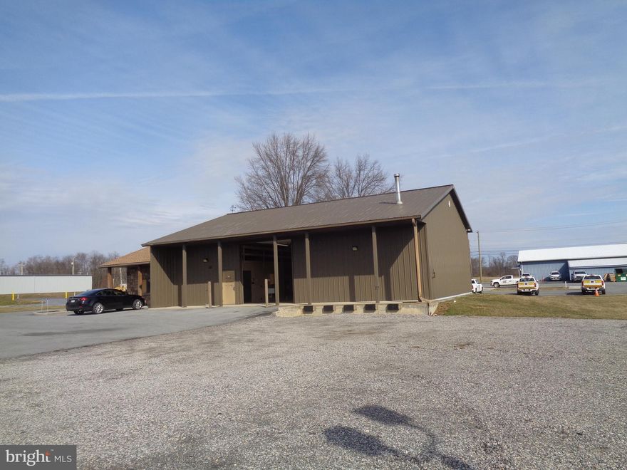 You don't find this opportunity everyday!!! Two buildings containing a total of 5609 square feet of flex space. Front building has 737 square feet of office space with an additional 2352 square feet of heated warehouse and mezzanine area. Oil-forced air in warehouse and electric hot-air with central air in office space. Rear building is 2520 square feet in size. Other features include 14' ceiling height in warehouse, pole-prefabricated wood frame structure, heavy gauge standing-seam metal roof (asphalt over office area), clear span fron building with 12' x 12' ground level door and exterior dock for smaller trucks. 200 Amp electrical service with 3-phase 4-wire electric and much more.