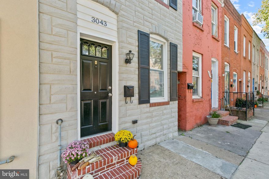 Like new row home in A+ location with PARKING + ROOFTOP DECK!   One block off Boston Street and a stones throw to Canton Waterfront Park!  Excellent floor plan with tons of exposed brick.  Large family room + half bath and coat closet on first floor.  High end kitchen with SS appliances and granite tops. A huge primary bedroom on the second floor with additional study that leads to the 3rd floor loft / bedroom/ home office which leads to a 2 tier rooftop deck This home has had all major systems updated including:  new deck railings and boards, new HVAC, new custom glass shower, new carpet on 2nd floor, new exposed duct work on 3rd floor, all new back windows, new roof, new washer / dryer, new vanity in owners bathrooms, new ceiling fans and recessed lights, AND MORE!  Over 60k of updates within the last 12 months!