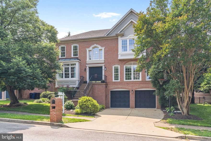 An exceptional home in North Arlington, this five-bedroom, three-and-a-half-bath colonial blends classic elegance with modern luxury across 3,848 square feet of beautifully designed living space. Perfectly positioned on a quiet cul-de-sac in the sought-after Stone Ridge neighborhood, this home is surrounded by meticulously maintained landscaping that creates a private, inviting setting.
A dramatic two-story foyer with graceful arch columns welcomes you inside, leading seamlessly to formal living and dining rooms and a newly refreshed gourmet kitchen with new stainless-steel appliances. The kitchen, complete with a sunny breakfast room, opens to a spacious family room featuring custom-built-ins, doors to the deck, and a cozy gas fireplace flanked by bookcases — ideal for everyday living and entertaining.
Upstairs, you’ll find four generously sized bedrooms, including a luxurious owner's suite with a spa-like bath retreat. The lower-level walk-out offers even more living space, featuring a second family room with a wet bar, a gas fireplace and built-ins, a music room, a full bathroom, and an au pair suite — perfect for guests or extended family.
Additional highlights include a two-car garage, an expansive deck, and a charming patio nestled beneath an under-deck area. Professionally landscaped grounds enhance the home's serene atmosphere.
Located on a peaceful street yet close to everything, this home offers easy access to parks, including Bluemont Park, Bon Air Rose Garden, Upton Hill, and the WO&D Trail. Conveniently situated just minutes from East Falls Church and Ballston Metros, with quick access to Route 50 and Route 66, it offers a quiet retreat with unbeatable convenience to DC.