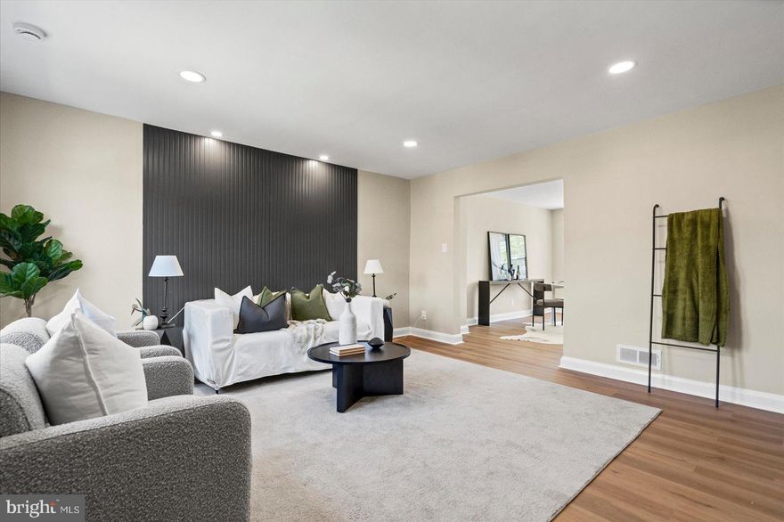 Welcome home to this fully renovated row house in the heart of Belair-Edison! This beautifully updated home offers the perfect blend of modern finishes and functional living space. The main level features a bright and inviting living room, a separate dining area, and a stylish updated kitchen. Upstairs, you'll find 3 spacious bedrooms and a full bathroom with contemporary finishes. The fully finished basement adds valuable additional living space and can easily serve as a family room, home office, gym, or even a potential fourth bedroom. There is also a 2nd full bathroom and a laundry room. Step outside to enjoy the large fenced-in rear yard. Move-in ready and waiting for its new owner!