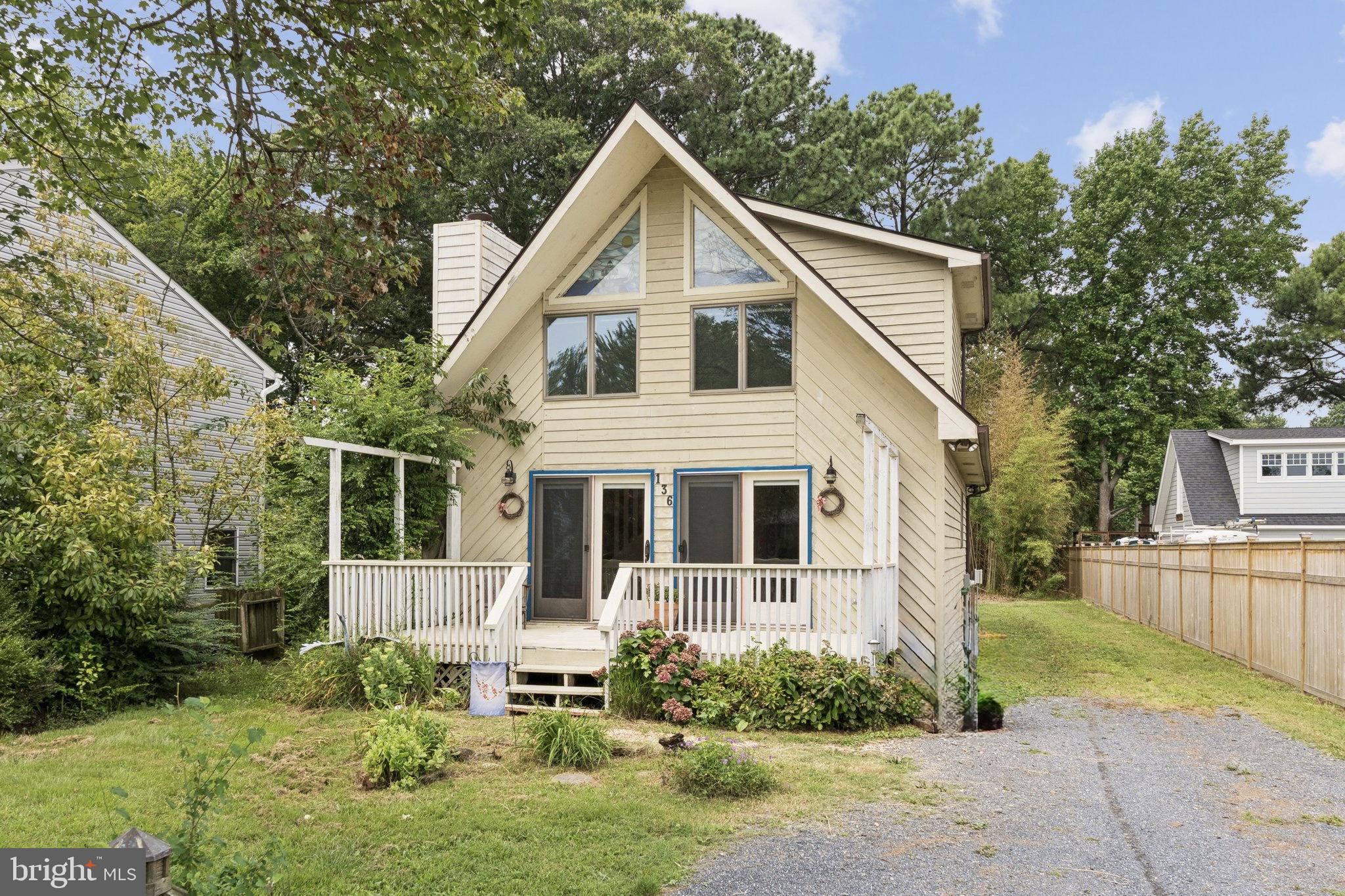 Adorable Coastal A-Frame in Romancoke on the Bay. Fall in love with this charming coastal-inspired A-frame nestled in the heart of Romancoke on the Bay on beautiful Kent Island! Bursting with character and natural light, this delightful home offers the perfect blend of comfort, style, and laid-back island living.
Step inside to a bright and airy main level featuring a cozy living area, an inviting all-season room ideal for morning coffee or sunset unwinding, a convenient main-level bedroom, and a half bath. Upstairs, two additional bedrooms and a full bath provide a peaceful retreat with peekaboo water views.
Enjoy the coastal breeze from your front deck, entertain in the spacious yard, and take advantage of the shed and ample driveway parking. With serene water views and community access to the Bay, this is your opportunity to embrace the Kent Island lifestyle in an adorable A-frame escape that feels like a vacation every day.
Whether you're looking for a weekend getaway or a full-time residence, this one has it all. Come see what makes this gem so special!
