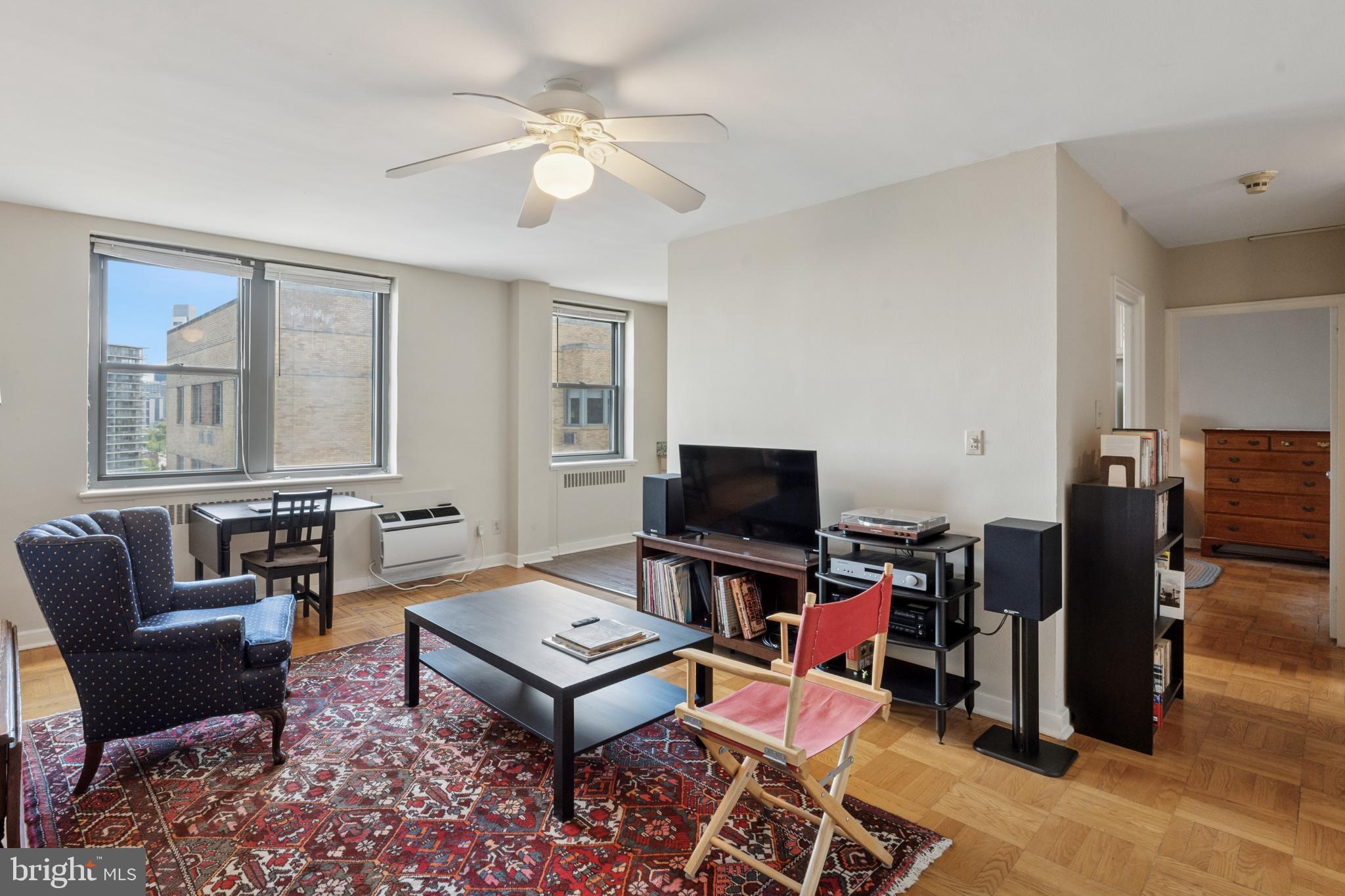 Enjoy sweeping eastern city views from this bright and well-maintained one bedroom home at 2601 Parkway Condominium. This unit features hardwood floors, an open-layout living and dining space, and a galley-style kitchen featuring gorgeous granite counters, gas range, dishwasher, refrigerator, and ample cabinetry storage. The spacious bedroom has a small walk-in closet and is located just past the tiled full bath. An in-unit washer/dryer and excellent storage space complete this lovely home. Monthly rent includes gas and water. 2601 Parkway is a pet-friendly building and all residents enjoy the services of a 24-hr front desk, secured entry, resident's lounge, fitness center, Center City shuttle service, and access to an on-site convenience store and restaurant. Conveniently located in the Art Museum neighborhood, this home is steps away from the Philadelphia Art Museum, the Barnes, the Schuylkill Running Trail and Fairmount Park, Whole Foods, Target, and the best of the Fairmount Ave dining scene.