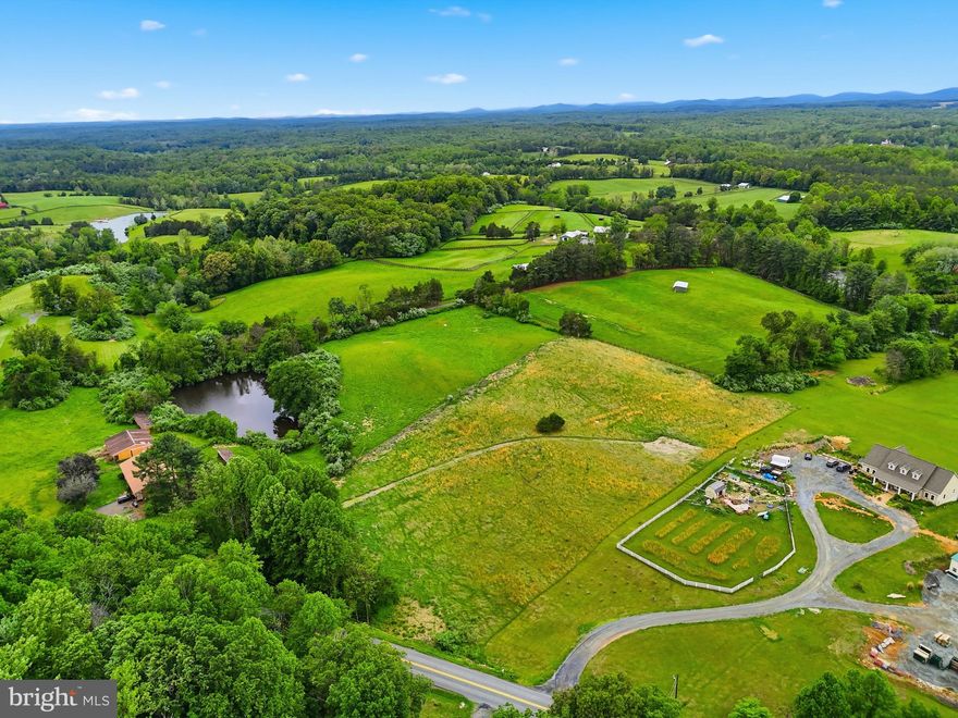 Discover a rare opportunity to build your dream home on a breathtaking nearly 5 acre lot in the heart of Northern Fauquier County, free from HOA restrictions. This ready to build property offers a conventional drain field approved for a 5 bedroom home, an installed VDOT approved driveway, and a cleared, leveled homesite surrounded by natural landscape and mature screening for immediate privacy. Enjoy peaceful surroundings protected by conservation easements while remaining conveniently located between the historic towns of Warrenton and Marshall with easy access to fine dining, vineyards, shopping, and major commuter routes. Experience the opportunity to create your custom estate in the heart of Virginia horse country.

Whether you are ready to build with your own builder, interested in partnering with the current owner builder, or simply searching for the ideal homesite to hold for the future, this property offers exceptional flexibility and long term potential.

The expansive lot provides ample space for a custom estate home, outdoor living areas, recreational enjoyment, and more, all while maintaining a peaceful and private natural setting.

If you have been dreaming of building your own home, this property is also being offered as a to be built home opportunity. Please see MLS# VAFQ2022246 for additional details. You may choose from multiple available floor plans, each offering the opportunity for customization to fit your lifestyle, design preferences, and budget.