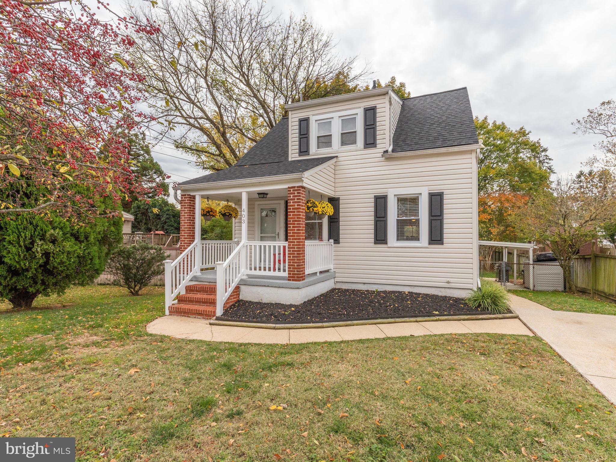 This lovely 3 bedroom, 2 bath cape cod offers a master bedroom suite on first floor with huge walk-in closet as well as a 2nd generous sized closet! Open floor plan with kitchen that boasts cherry cabinets, stainless steel appliances and granite counter tops! Large 36" x 81" kitchen island allows extra counter space, eating space or keeping the cook company! Both bathrooms feature custom tiling. You will love hanging out in the lower level family room gathered around the beautiful gas brick fireplace (rumor has it the bricks are from our beloved Memorial Stadium!) New architectural roof in 2015! New HVAC in 2015! Re-insulated 2nd floor attic to save on those utility bills! Enjoy sitting on the covered front porch which has just been resurfaced with Graniflex concrete coating system! Large fenced in rear yard for outdoor fun! Come see this gem of a home!