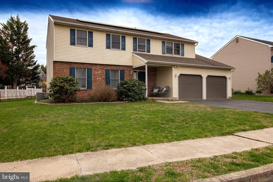 Welcome home to this spacious 4-bedroom home offering comfort and functionality. Nestled in a family friendly neighborhood, this home is perfect for a growing or large family. The main level includes a cozy wood burning fireplace, formal dining room ideal for hosting holidays, and a large deck off the family room ideal for family get togethers and entertaining! Enjoy the convenience of a fully finished basement-perfect for extra living space, a home office or escape. The upper floor includes a large primary suite with its own deck that has a unique spiral staircase down to the main deck! Also on this level are three more bedrooms, a hall bath and a conveniently located laundry room. Additional highlights include an attached two-car garage and efficient solar panels to help reduce utility costs. This home combines comfort and practicality in a welcoming community setting-don't miss the opportunity to make it yours!