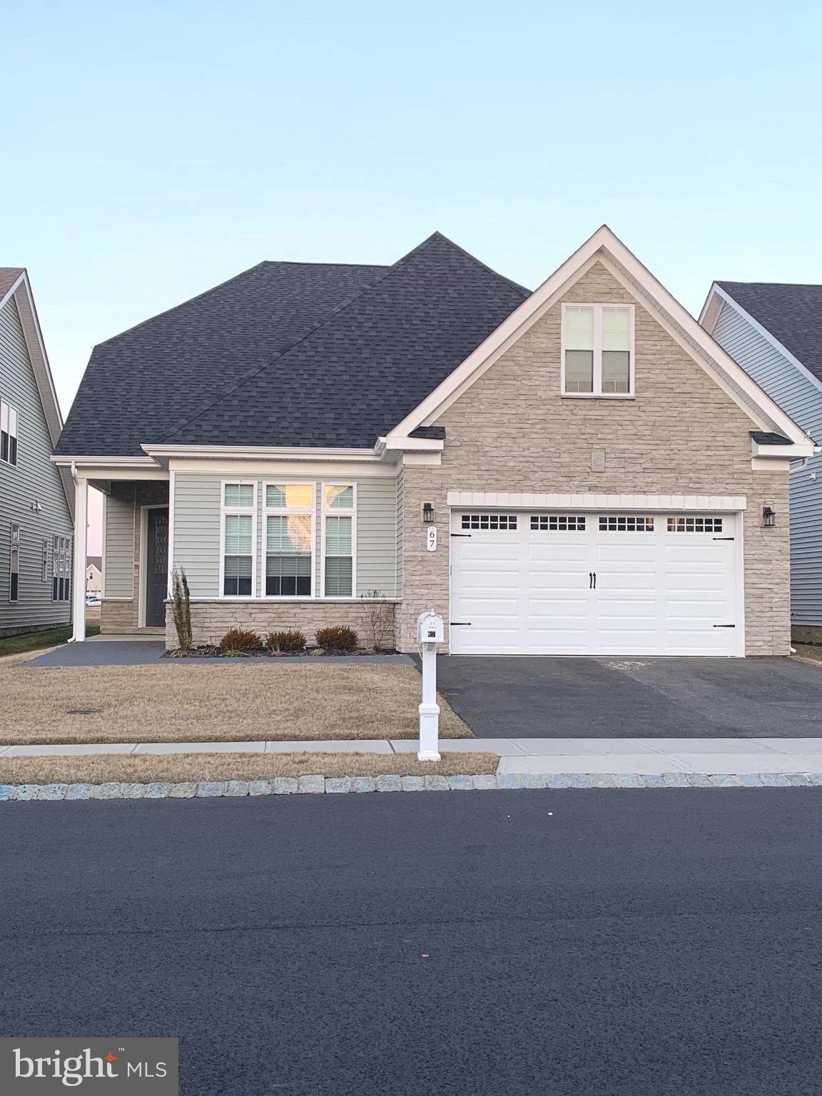 ***WELCOME TO ROBBINSVILLE'S NEWEST GATED COMMUNITY FOR 55+ ACTIVE ADULTS.***
STUNNING ROBBINS Model Home with an Open Floor Plan and Elegant Finishes in Robbinsville's Crown Jewel Premier 55+ Active Adult Community , Raajipo.
The Robbins Features a Spacious Layout with 3 bedrooms {2 bedrooms on Main Level} and 3 Full Bathrooms,, 2 Bathrooms on the Main Level .
A Lofty Great Room with a Cathedral 20 foot ceiling , a Floor-to-Ceiling-Hearth Wall for an Inset Fireplace.
A Gourmet Kitchen with an Island,Stainless Steel Appliances,Quartz Countertop and Tiled Backsplash, Chimney Hood and a Cast Iron Cooktop
Large and Plentiful Closets, a Loft Living Area on the second floor as well as a Walk-in Partially finished attic for storage. The first floor has 9-foot ceilings with tray ceiling up to approximately 11 feet.
In addition, there is a 2-car garage and laundry on the first floor.
Walk to the Brand-New Clubhouse, which comes with event space, a state-of-the-art gym, conference room, an inground pool, tennis courts, relaxing Gazebo and more.
67 Samjan is within 15 minutes of The State of the Art Princeton Hospital, BAPS Akshardham Temple, Ample & Varied Big Box & Small Family owned Businesses, 2 Farmers Markets and easy access to NJTP, Rt 130, Rt 195 & Rt 295. 20 Minutes to Princeton Junction Train Station, and Princeton University& Princeton Restaurants and Shopping.