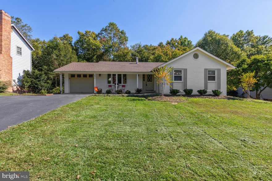 HOPING TO GO ON THE MARKET 10/14/2023  Wonderful Rambler, that has just had a new landscape plan completed in the front along with an attractive new walkway.  Updated kitchen and bathrooms in the home.  Primary suite has a beautiful  enlarged shower and  updated vanity, there is a sliding glass door, a perfect setting to add a deck to enjoy a quiet morning or evening with your coffee, tea or glass of wine to end the day.
Spacious family room downstairs with an inviting fireplace, with mantle and hearth,  and a sliding glass door out to the patio along with another door out from the laundry room area.  Several storage rooms also in the lower level. Beautiful private fenced back yard complete with a shed.  Yard backs to a large treed area. Screened deck and open deck space off the living room, great for bird watching or overviewing  what's happening in the back yard.  Extra wide driveway in the front  NO HOA's.  Cloverly Elementary School.