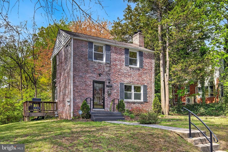 Corner lots like this don’t come along often, and neither do homes this move in ready. Set on one of Takoma Park’s most desirable parcels in the Carole Highlands neighborhood, this handsome brick Colonial offers 1,599 sq ft of beautifully maintained living space and a yard with a fenced-in portion that’s perfect for pets. The large yard is perfect for gardening or gathering, and a lush tree line provides ample privacy. 

Inside, rich hardwood floors flow throughout, anchored by a wood-burning fireplace that brings warmth and character to the main living area. The renovated kitchen shines with quartz countertops and opens directly onto a private side deck, which could serve as personal retreat for morning coffee and is very convenient for grilling.

The main level is as flexible as it is inviting, with a den off the dining area that adapts effortlessly to a home office, playroom, or second living space. Upstairs, two spacious bedrooms and a full bath offer comfort and calm.

The fully renovated lower level is a true bonus, offering a third bedroom, second full bath, washroom sink, ample closet storage, and recessed lighting. All systems are new and in working order, including a washer and dryer, upgraded insulation, sump pump, and HVAC making it as practical as it is polished.

All of this is just steps from shops, trails, and public transit and will be only a short walk away from two Purple Line stops when it opens, making it one of Maryland’s most vibrant and walkable communities.