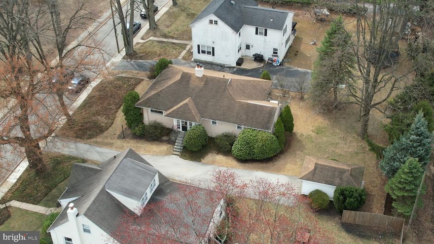 **Best and Final offers by end of day today, Saturday, 4/12** A tremendous opportunity awaits in sought-after Springfield Township, right in the heart of town. This charming 2-bedroom, 2-full bath bungalow boasting nearly 1500 sq ft of living space, tucked at the end of a cul-de-sac, offers flexibility for a 3rd bedroom, the convenience of one-floor living, and the added benefit of being within walking distance to all that Springfield has to offer in the center of town. 

Inside, the generous living room with hardwood floors flows into the formal dining room and the adjacent bonus room. This room offers views of the street and cul-de-sac and playground and can easily be transformed into a 3rd bedroom, home office, or playroom. The spacious kitchen off the dining room provides room to eat, a pantry closet, and access to the unfinished basement and side entrance. On the opposite side of the living room, you'll find the primary bedroom, which is well-sized with ample closet space and an en-suite bathroom that features a sink off the hall, with a separate shower and toilet area. Completing this side of the home, there is a ceramic-tiled hall bath and a second generously sized bedroom.

The unfinished basement offers abundant storage space, laundry, and room for mechanicals. Additional features include a nearly new gas boiler, central air,  200AMP service, a level rear yard, and a private driveway with space for 3-4 cars. The township park, playground, and courts are easily accessible from the cul-de-sac, and you can walk to Saxer Avenue’s shops, restaurants, and stops, including RiteAid, Wawa, the Library, as well as both the high school and middle school. Multiple places of worship are nearby, and easy access to the trolley and major routes like Route 1 and 476 make commuting to King of Prussia, Delaware, downtown Philadelphia, the airport, and more a breeze.