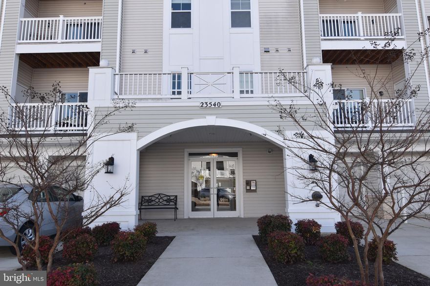 Lovely condo with hardwood floors.  Kitchen with granite counters.  3 wall mounted TV's.  Condo community with access to gym.  Walking distance to shopping and dining.  Includes garage #23.  Rent includes, water, sewer, trash.   Credit application to be completed online:  https://listing2leasing.com/q.php?q=23540-fdr-blvd207-california-md-20619-rp2kmz