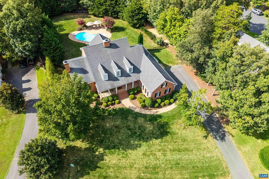 The timeless elegance found in GLENMORE is beautifully reflected in this stunning 4 bedroom Keswick residence set upon a 3/4 acre elevated homesite. Lush manicured grounds surround this meticulously maintained home. Two Primary suites, two fireplaces, three car garage and a modern culinary kitchen & pantry. Exclusive random width distressed oak flooring and staircase by Mountain Lumber found throughout. Brand new carpeting in all 2nd level bedrooms. The resort style salt water pool is simply gorgeous and is surrounded by mature & lofty trees that offer four season privacy. Exquisite covered patio is an entertainer's dream. Irrigation system encircling the home, whole house generator & a newly paved driveway. The expansive, level backyard invites gatherings, friendly lawn games?badminton or bocce?and plenty of space for pets to play.. See Documents for a detailed list of features.,Cherry Cabinets,Painted Cabinets,Quartz Counter,Wood Cabinets,Fireplace in Family Room,Fireplace in Master Bedroom