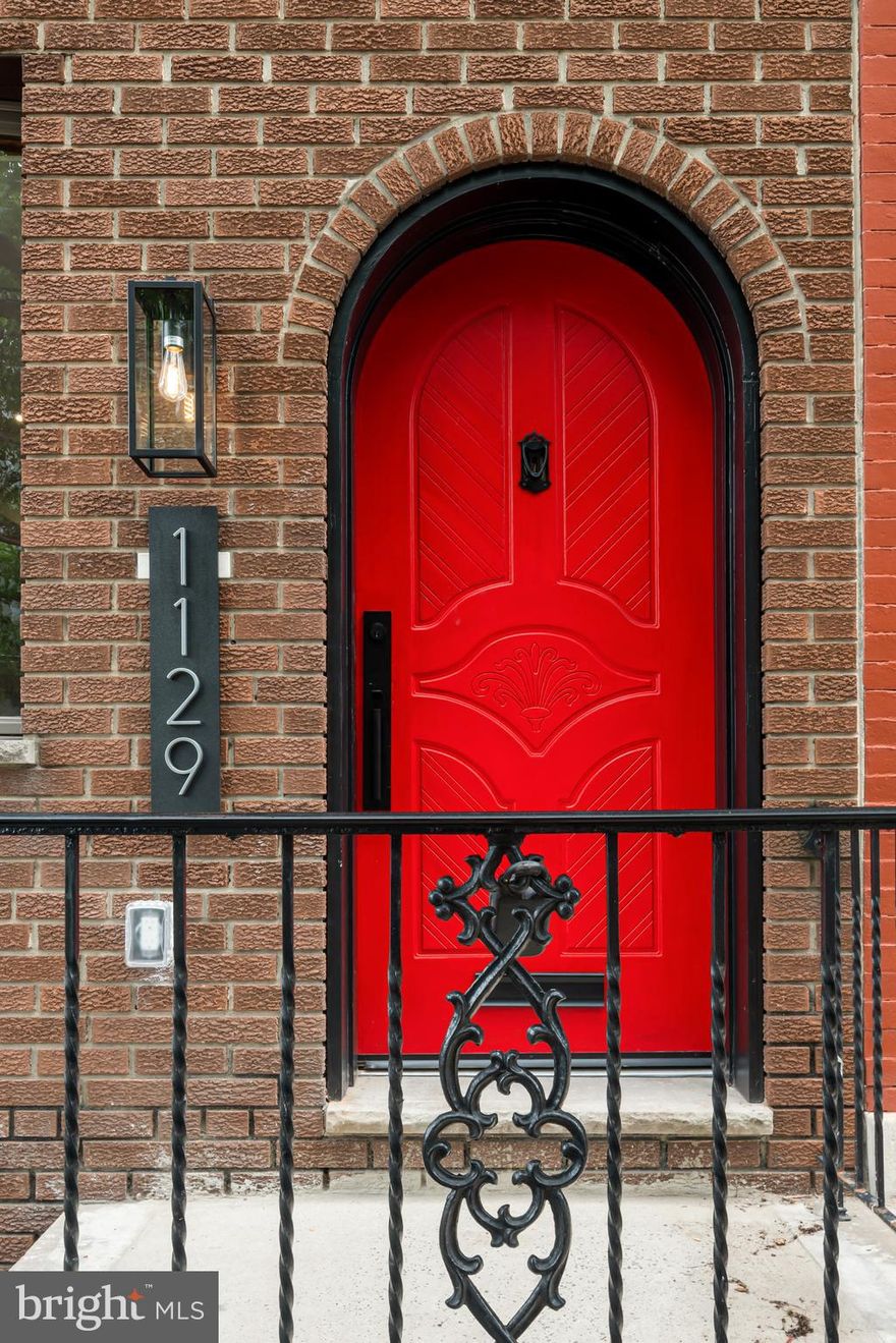 Welcome to 1129 S 12th St, a fully renovated 3-story end-of-row home in Passyunk Square, updated top-to-bottom in 2022. This 3 bed, 2.5 bath home features hardwood floors throughout, an open-concept main level, a spacious kitchen with ample storage, and a convenient first-floor half bath. The second floor offers two generously sized bedrooms, a full hallway bath with heated floors, and easy access to laundry. The third floor is a private primary suite complete with a large closet and spa-like bathroom featuring heated floors, soaking tub, glass-enclosed shower, double vanity, and high-end finishes. Additional highlights include central A/C, a finished basement with extra storage, and a private rear patio perfect for outdoor entertaining. Ideally located just two blocks from Broad St and Washington Ave with easy access to shopping, (Target, Giant, Starbucks, Sprouts, etc), dining, and close proximity to the Italian Market, Passyunk Ave, and public transportation.