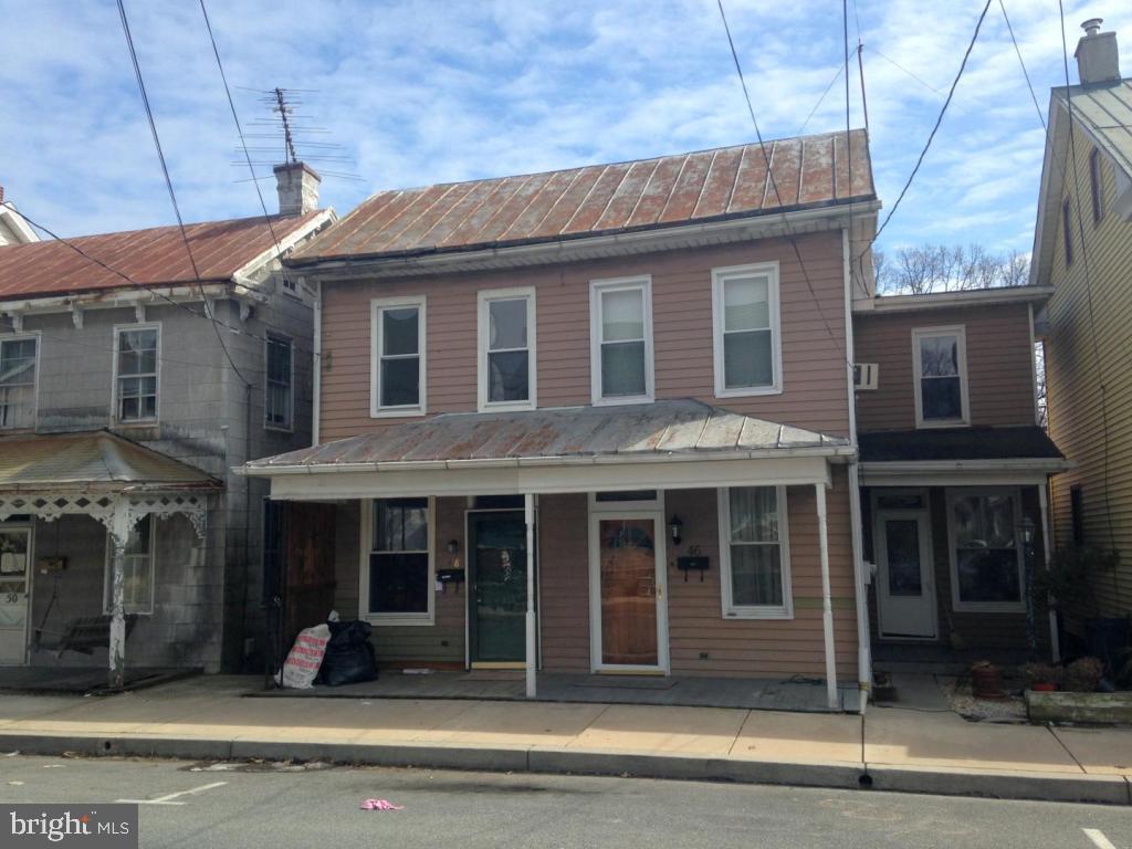 Nice remodeled 3 Bedroom, 1.5 Bath semi close to park. Tiled kitchen floor. Deep yard. Off street parking, replacement windows, full basement & enlarged deck.