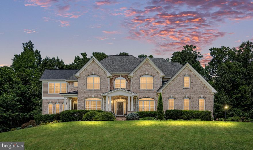 Welcome to an exquisite sanctuary where elegant architecture, meticulously maintained acreage, and exceptional outdoor living blend seamlessly into one extraordinary lifestyle. Nestled on over 12 sprawling acres, this custom all-brick traditional estate offers more than 6,400 square feet of refined living space, including 5 bedrooms, 3.5 baths, and timeless architectural detail throughout.
Surrounded by curated landscaping and total privacy, the property showcases breathtaking views of a fully stocked 1.25-acre pond, center 14ft deep, features grass carp, redear sunfish, bluegill, largemouth bass, catfish, and hybrid crappie. Enjoy endless outdoor recreation from the large floating dock which is perfect for fishing, swimming, sunbathing, or tying up the paddle boat, which stores conveniently in the charming boathouse. An elegant gazebo overlooks the water, creating the perfect setting for cookouts, quiet evenings, or stargazing by the pond.
The expansive backyard, framed by a lush treeline, includes a generous fire pit, storage shed, and ample space for a future pool. Two septic drain fields are thoughtfully positioned to the right side of the backyard (when facing the treeline). Additional exterior highlights include a three-car side-load garage, leaf-guard gutters, low-maintenance trim, and a whole-house generator. The upper-level morning room is finished in Hardie Plank siding, while the remainder of the home features classic brick construction.
Inside, a sophisticated yet welcoming interior awaits. A grand foyer with hardwood flooring is flanked by a spacious formal dining room—ideal for hosting holiday gatherings around an extended dining table. The living room is filled with natural light and captures serene views of the pond and side yard.
The open-concept gourmet kitchen features an island, abundant counter space, and a breakfast area perfect for casual mornings. Step outside to the patio for grilling, entertaining, or enjoying coffee while overlooking the peaceful treeline. Adjacent to the kitchen, the expansive family room with fireplace offers access to a covered terrace with tranquil pond views.
The show stopping morning room provides panoramic water views and an inviting space to relax year-round while watching loved ones enjoy the property.
Upstairs, a grand staircase leads to five bedrooms and three full baths, including a luxurious second primary suite complete with its own private morning room overlooking the pond, fireplace, dual closets, vanity area, and Jack-and-Jill bath. The main primary suite is equally impressive, featuring a large sitting area and spa-like en-suite bath with a garden soaking air tub, walk-in shower, dual vanities, and an expansive walk-in closet. The upper-level laundry room adds everyday convenience.
The unfinished lower level offers endless possibilities—design your dream media room, additional family space, kitchenette, full bath, recreation area, or private guest quarters. There is abundant storage, and the cabinetry in the storage area conveys.  The basement walkout provides direct access to the side yard with pond views.
Although privately set with a peaceful rural ambiance, the estate is just minutes from downtown Culpeper with convenient access to Routes 15, 29, and 3.  Other major shopping and dining areas are in Orange and Fredericksburg which are approximately 20-40 minutes away.   A unique historical note, the end of the court it connects to “Thomas Jefferson’s Road,” which is believed to have been traveled by Thomas Jefferson on his journeys to Washington, D.C.     14457 Kimber Lane is more than a home—it is a rare opportunity to own a one-of-a-kind estate in one of Virginia’s most picturesque settings!    See drone video