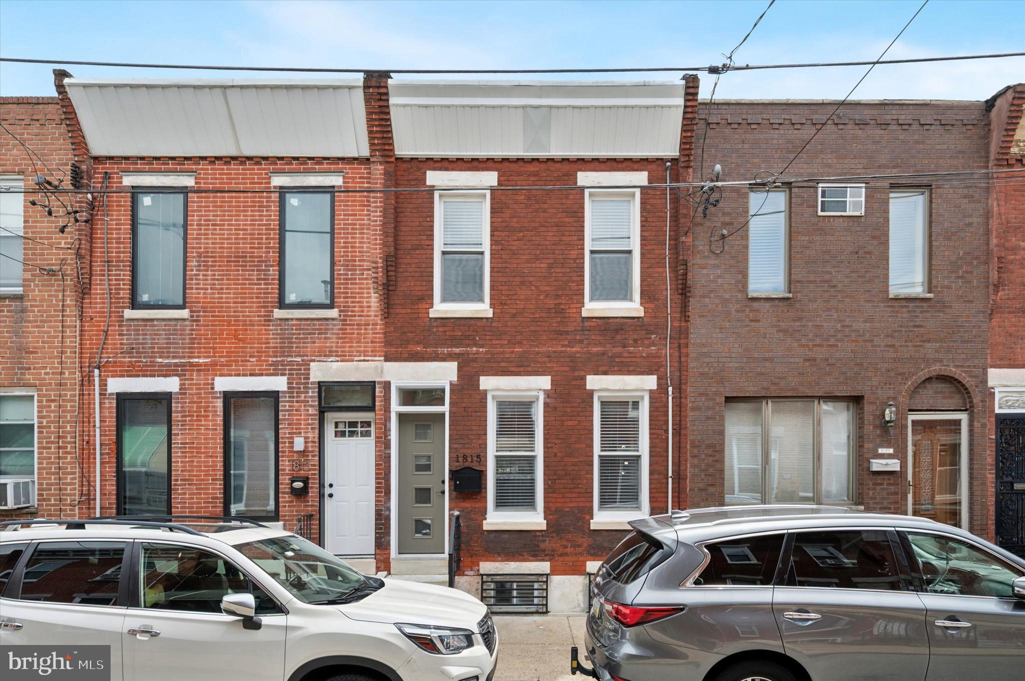 Welcome to this Beautifully Updated Home in the Heart of Newbold, South Philadelphia!
Step into this charming 2-story rowhome offering 3 spacious bedrooms, 2 full bathrooms, and a nice-sized backyard—perfect for summer barbecues or relaxing evenings outdoors.
Remodeled in 2021, with additional updates in 2024, this home features a newer roof, fresh paint throughout, and gleaming hardwood floors. The modern kitchen boasts newer cabinets, elegant tile work, and Butcher-block countertops, ideal for home chefs and entertainers alike!
As you enter the home, you are greeted by a gorgeous, newly installed front door that opens up and an expansive living room and dining room await you. The open floor plan flows perfectly, with plenty of natural light coming in. The owner added modern furniture to the home completely matching the renovations that were installed. As you walk out your newly installed rear storm door, you are greeted by even more sunshine, a patio set-up and a foliage wall with outdoor lighting hanging above you, perfect for relaxing nights.
Downstairs, the basement space currently provides an a walk-in closet, but the concrete basement can be used for a multitude of reasons. It can be used simply for storage or can easily be converted into a home gym, or bonus room to suit your lifestyle needs. It also comes with a full bathroom downstairs as well, along with a newer hot-water heater and furnace.
Additional recent upgrades include updated lighting fixtures, modern hardware finishes, and brand-new smooth steel entry doors at both the front and rear. A new fridge/freezer combo also adds to the convenience of move-in-ready living.
Don’t miss the opportunity to own this beautifully maintained home in one of South Philly’s most sought-after neighborhoods. Schedule your tour today!