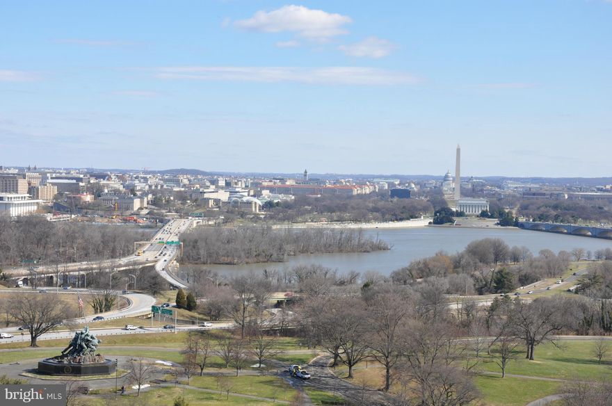 Amazing views of DC skyline and monuments from this 2BR,2 BA condo. Living room with a wall of windows walks out to large balcony to enjoy the views! Updated gourmet kit w/ SS apps and granite counters! Beautiful, updated baths! All utilities included, 24 hr front desk, outdoor pool, parking and gym! Walk to Rosslyn Metro. Great floor plan for entertaining.