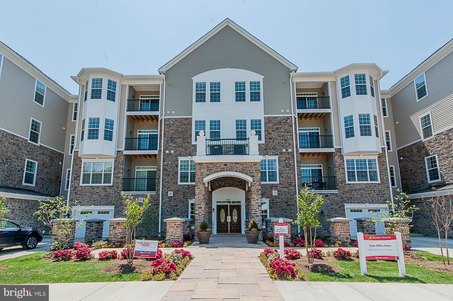 Immediate Delivery! Stunning new community surrounding Quarry Lake. Top floor, luxury condo with garage. Enjoy the granite countertops, maple cabinets throughout, hardwood foyer and kitchen. Great owners suite with sitting area and bay window. Call the Beazer sales center for more info.