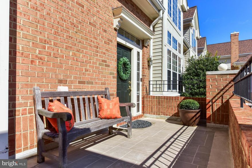 A LUXURY LIFESTYLE beyond compare at the Gates of Westfalls!Living in a stunning renovated condo in the shadow of the METRO and close to shopping, dining and schools is your dream come true. Call for your personal tour right away. You've got to see the stainless and granite kitchen with classic white cabinets. You will swoon over the new Owners' Suite bath with Carrara-topped double vanity, soaking tub & large stall shower. This spa-like oasis offers long, luxurious soaks! All of this plus Living, Dining and Family Rooms on a light-filled, open concept main level with access to an expansive stone patio. Upstairs, just off the large loft perfect for office, play or exercise, is a spacious bedroom with high ceilings and a classic white bath with stunning Carrara vanity.Your dream come true home also features two garage parking spaces, lots of storage and beautifully landscaped community grounds. No more shoveling, no more raking.Lock and Go!  Plus check out all that is going to happen just two blocks away in the new and exciting development Little City Commons at the corner of Haycock and Leesburg Pike. This 10.3 acre development will bring more upscale dining, retail, one acre of open space with waterfalls, games and room to chill out. An amazing new concept that will create the amenity-rich environment to enhance your every day life. A Classic and Convenient Condo! You will be Captivated.