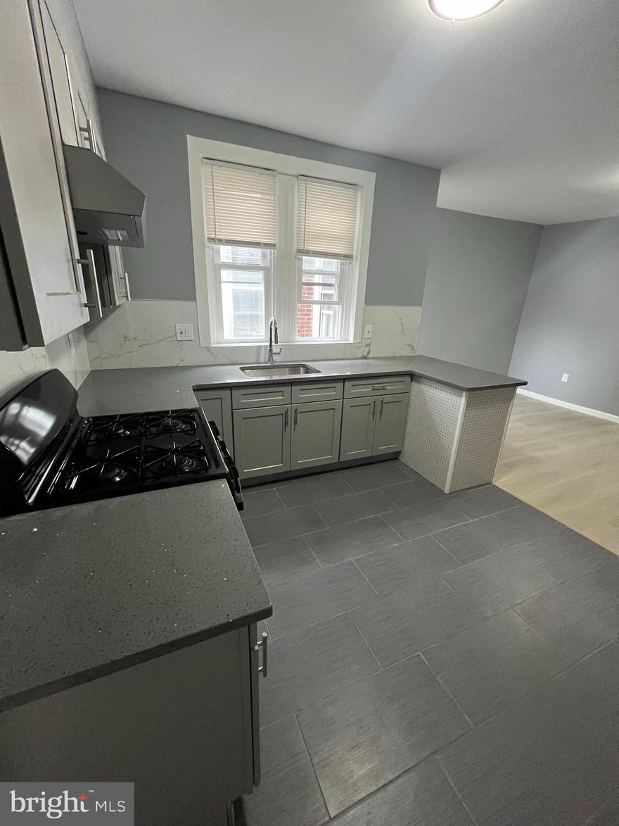 Welcome to 5917 Spruce St to this newly renovated 2 bedroom and 1 bath Apartment. Walk into a private entrance on the 1st floor, then into the living room where you will enter with freshly painted walls throughout with H/W flooring in the living room and bedrooms. Both bedrooms are nice size with ample closet space and newer windows and shades. Your kitchen is well decorated with Granite Counter Tops Light grey cabinetry, gas range, range hood and refrigerator. Ceramic tile flooring and backsplash around the walls. You can decompress after work in your large shower with ceramic tile surround and flooring, vanity and vanity mirror. This property is located a short drive to Upenn and Drexel University. Market Frankford line just minutes away.

Applicants should have a credit score of 625 or above with no judgements, evictions or filings. Income must be 3x's the monthly rent or 3950.00 . $50.00 flat fee for water.