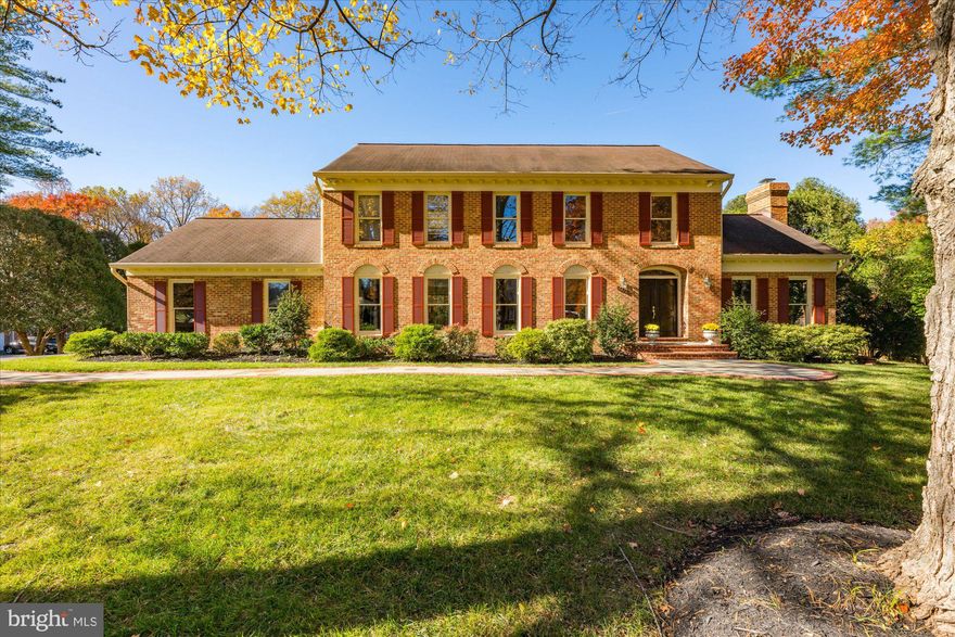 Sited handsomely on over a half acre, this home offers approximately 4,750 sf of living on three level with exceptional flow from indoors to outdoors. The main level features a gracious foyer flanked by the formal living and dining rooms.  A family room with a vaulted ceiling, fireplace, wall of built-ins and glass doors to the backyard and patio, The kitchen with a center island has spacioius breakfast nook with sliding glass doors to multiple patios.  The main level is complete with a private library, laundry room and two car side load garage. The upper level includes a generous primary suite with a sitting room with a fireplace, large bath and walk-in closet. In addition the upper level has three secondary bedrooms and two full baths. The lower level has an expansive recreation room with a bar, a guest suite with a full bath, a bonus / exercise room and ample storage. The property has extensive hardscaping and landscaping. McLean Estates is located minutes from Tysons, the Toll Road and 495, Spring Hill Recreation Center and several parks and trails.