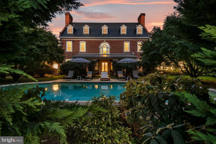 Live authentically. Woodholme Reserve, circa 1912. Style abounds. Discover a sumptuous architectural gem. Nestled amongst mature trees and lush landscaping, a sense of seclusion prevails. Maximalist and fabulous! Every detail has been tended to. Each space is something to behold and relish the experience of being present. Exquisite crown moldings and subtle architectural touches whisper the poetry of enduring design. Each room is balanced and strong awaiting your aesthetic essence to be infused. Bathed in natural light, the sunroom, surrounded by graceful arched windows, invites relaxation. A grand dining room beckons for lively gatherings. Upstairs, the primary suite offers a private balcony, dressing room, and luxe bath with heated floors. Additional rooms with ample space to host guests with ease and comfort. Cozy up to any one of the six wood burning fireplaces. Listen to the sweet sounds of nature or dine al fresco under the stars while taking an evening dip in the pool. Feel worlds away while being close to everywhere you need to be. A place of enduring grace, where history and style converge in perfect harmony. Verizon Fios Internet. Cultivate your existence. The art of uniting human and home.
Maryland Historic Trust
National Register of Historic Places