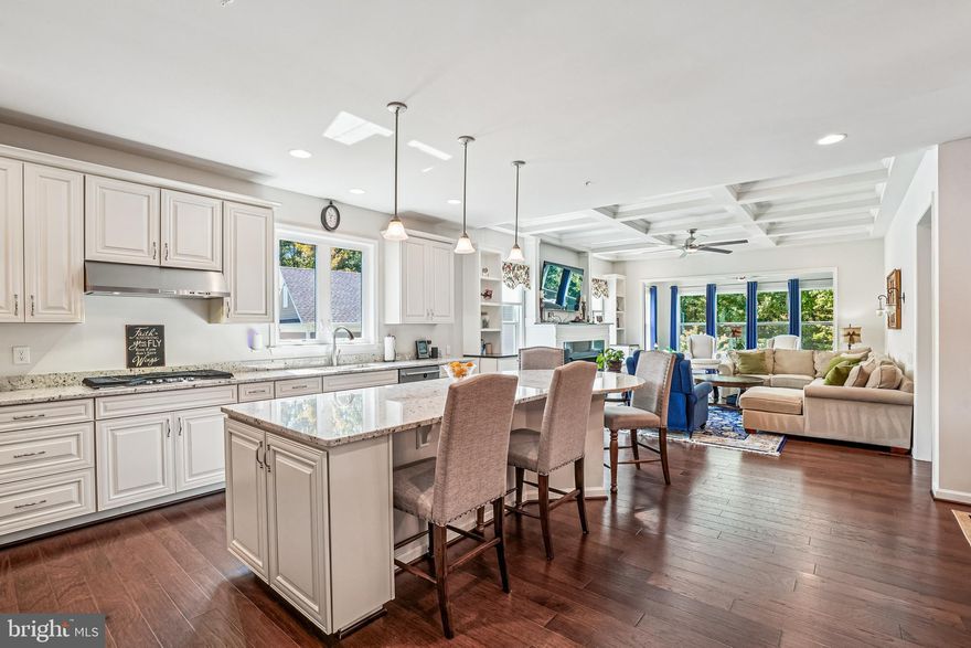 Beautifully upgraded single-family home in the highly sought-after Celebrate Virginia North neighborhood, a 55+ community by Del Webb. This home is a perfect blend of comfort, style, and convenience, offering approximately 4,694 square feet of well-designed finished living space with four bedrooms and four full baths and gourmet kitchen with granite counter tops. The open concept living area is filled with abundant natural light, enhancing the bright and airy feel of the home. It is anchored by a cozy custom built gas fireplace flanked by built-in window seats, creating a warm and inviting ambiance. A sun room bump out leads out on the deck providing a relaxing spot to unwind while enjoying serene wooded views. Throughout the home, crown molding, wainscoting, upgraded light fixtures, and beautiful wood flooring add to the character and modern aesthetic. This home boasts a thoughtfully planned layout with elegant touches throughout. The primary bedroom serves as a peaceful retreat. The second bedroom on the main level offers flexibility, ideal for use as a guest room. Off the entryway is a private room, which can serve as an office or den, providing even more versatility to suit your needs. Both bathrooms on the main level are conveniently located to meet the needs of residents and guests alike. Upstairs in the loft is an additional bedroom, full bath and second family room. In the basement, you'll find a large recreation room complete with a fourth bedroom and bathroom, and a bonus room perfect for a home gym. There is a large unfinished storage room that can be used for storage or even a crafting room or workshop. Living in Celebrate Virginia North means access to an array of resort-style amenities, including: · A clubhouse that serves as a social hub for events and gatherings. · Both an outdoor community pool and a year-round indoor pool and hot tub for aquatic enjoyment. · A fully equipped gym to support an active lifestyle. · Pickleball courts for a fun, social way to stay active. · Scenic walking trails, perfect for staying connected with nature and meeting neighbors. This vibrant community provides the perfect blend of relaxation, recreation, and social opportunities, making it an ideal home for those seeking an enriched 55+ lifestyle